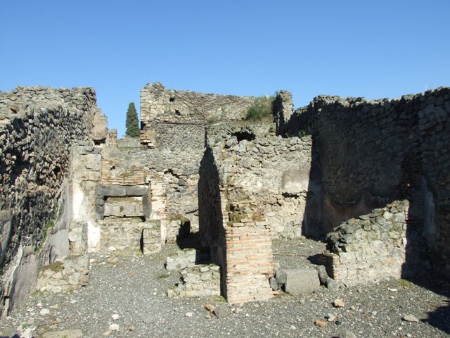 I.3.1 Pompeii. September 2010. Looking east towards east wall and oven internal north-east corner. Photo courtesy of Drew Baker.