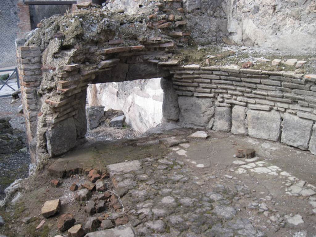 I.3.1 Pompeii. September 2010. Looking west across oven, showing close up of oven door from inside oven. Photo courtesy of Drew Baker.
