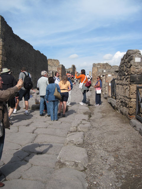 I.3.1 Pompeii. 1935 photograph taken by Tatiana Warscher. Looking south-east towards south side of entrance doorway on Via Stabiana, and roadway (Via Secunda).
See Warscher T., 1935. Codex Topographicus Pompeianus: Regio I.3. (no.80), Rome: DAIR, whose copyright it remains.
 