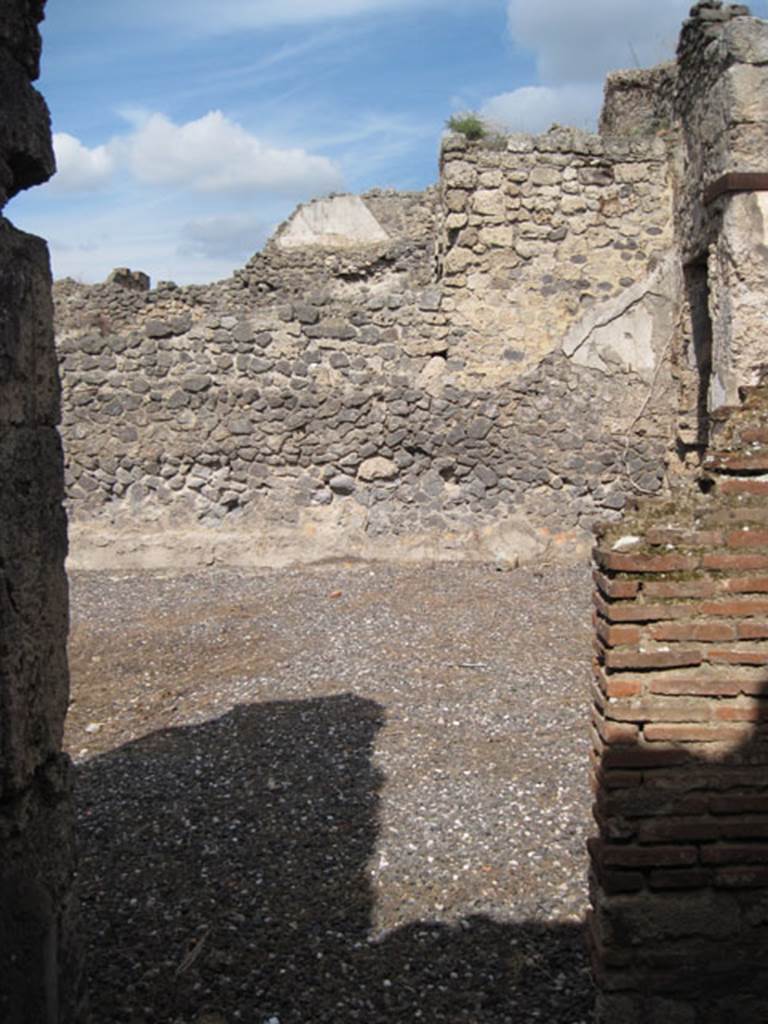 I.3.3 Pompeii. September 2010. 
Looking north out of doorway leading into atrium, in room next to corridor leading to kitchen area. 
Photo courtesy of Drew Baker.

