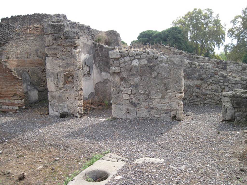 I.3.3 Pompeii. September 2010. Looking towards south wall of atrium. Photo courtesy of Drew Baker. According to Warscher, quoting Mau, from Bull. Inst. 1874, p.177-179, she wrote – “L’impluvio è privo del suo rivestimento di pietra………a destra dell’atrio sono tre camere senza interesse…”  (translation: "The impluvium was devoid of its stone cladding ……… to the right of the atrium were three rooms without interest ..."
See Warscher, T, 1935: Codex Topographicus Pompejanus, Regio I, 3:  Rome, DAIR.  
