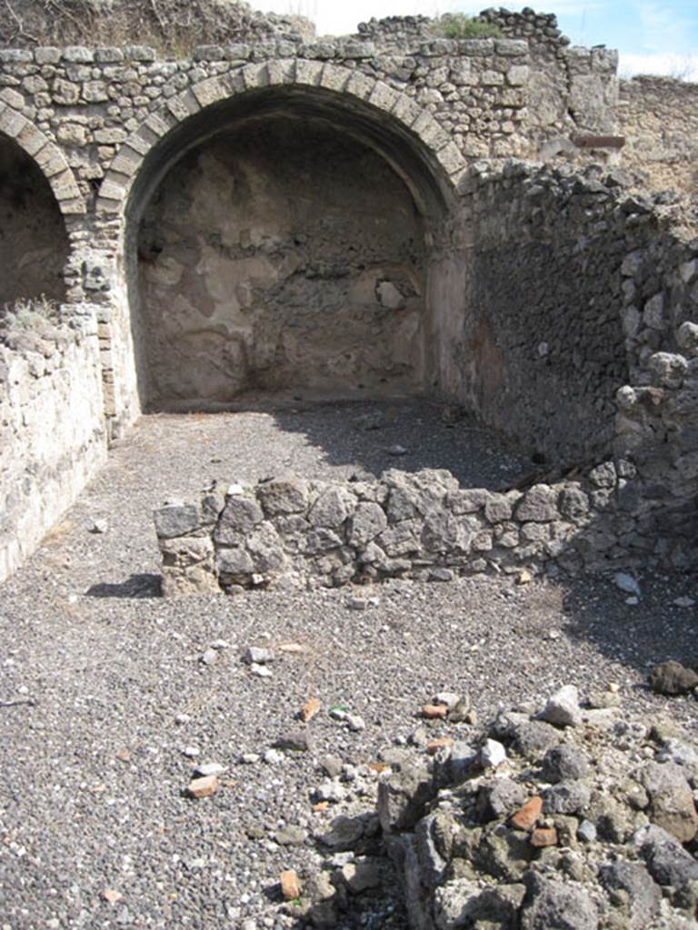 I.3.5 Pompeii. September 2010. Looking east across the north side of the entrance room. Photo courtesy of Drew Baker. At the rear of the entrance room was a doorway to the rear vaulted room. According to Fiorelli, on the right of the doorway above the remains of the wall, a large window allowing light to the rear room was found. 
