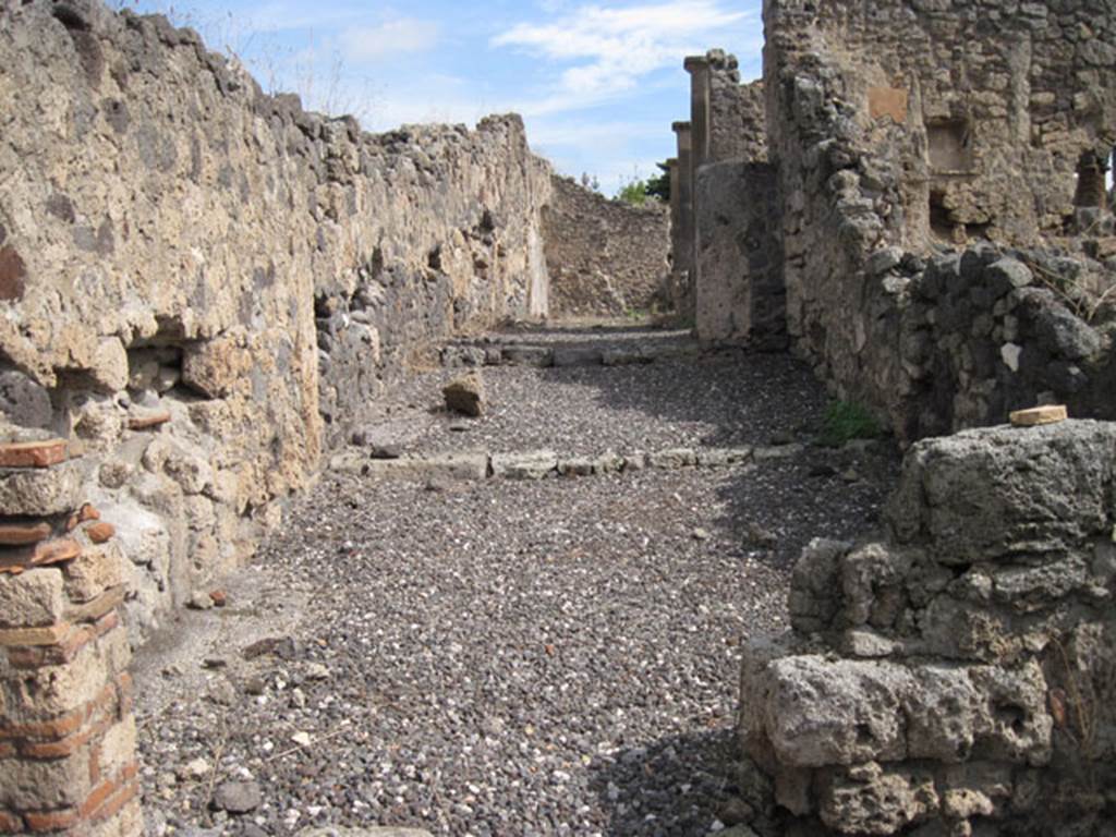 I.3.8b Pompeii. September 2010. Looking east up the angiportus from the entrance doorway. Photo courtesy of Drew Baker.
