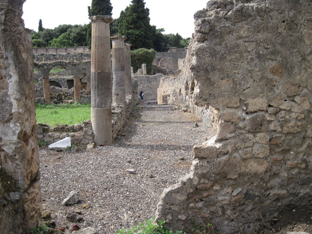 I.3.8b Pompeii. September 2010. Looking towards west wall and doorway to north-east corner of peristyle, from small room. Photo courtesy of Drew Baker.
