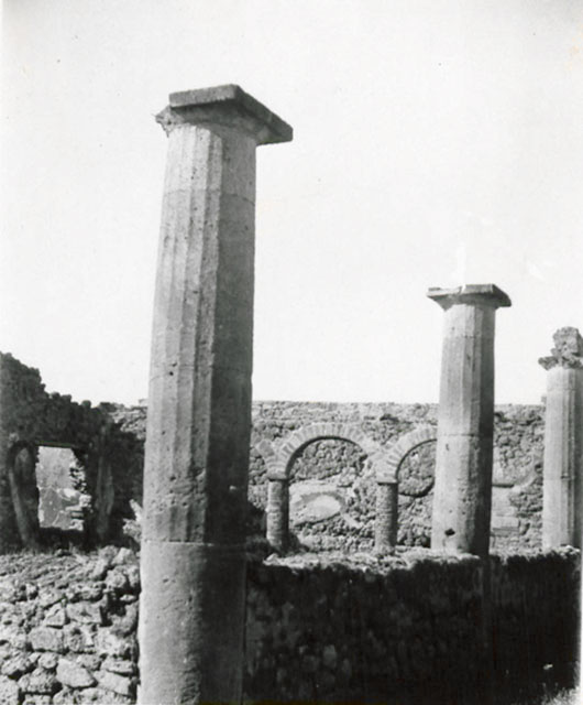 I.3.8b Pompeii. 1935 photograph taken by Tatiana Warscher. Looking west along the north portico, and the arches of the west portico.  
See Warscher, T, 1935: Codex Topographicus Pompejanus, Regio I, 3: (no.20), Rome, DAIR, whose copyright it remains.  
