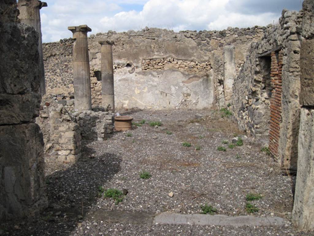 I.3.8b Pompeii. September 2010. Looking north across east portico of peristyle, from oecus in south-east corner. Photo courtesy of Drew Baker.
