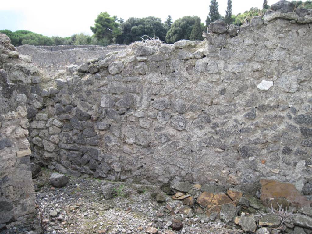 I.3.8b Pompeii. September 2010. West wall and south-west corner with doorway to small room on south side. Photo courtesy of Drew Baker.
