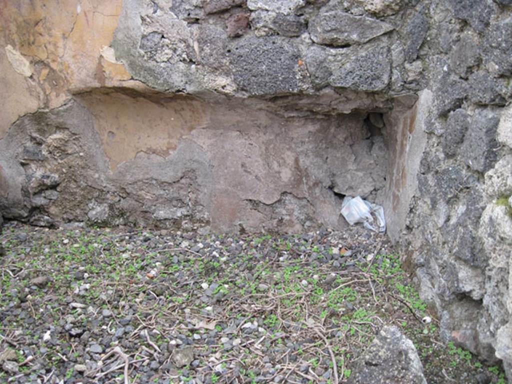 I.3.8b Pompeii. September 2010. Detail of recess in south-west corner of small room.
Photo courtesy of Drew Baker.
