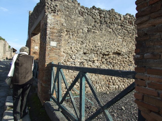 I.3.13 Pompeii. September 2010. Looking south from entrance doorway towards corridor and doorway to rear room in south-east corner. Photo courtesy of Drew Baker