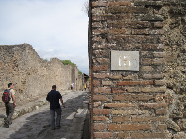 I.3.13 Pompeii. December 2007. Looking south across shop towards corridor and rear rooms.