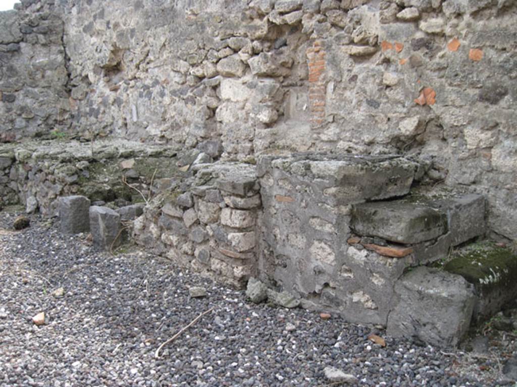 I.3.15 Pompeii. September 2010. West wall with detail of step and niche on west wall. Photo courtesy of Drew Baker.