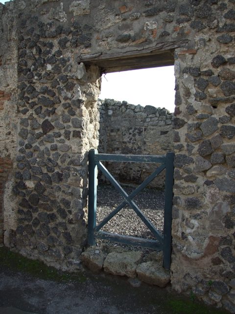 I.3.18 Pompeii. December 2007. South wall with doorway blocked in antiquity, originally leading to a room in I.3.20.