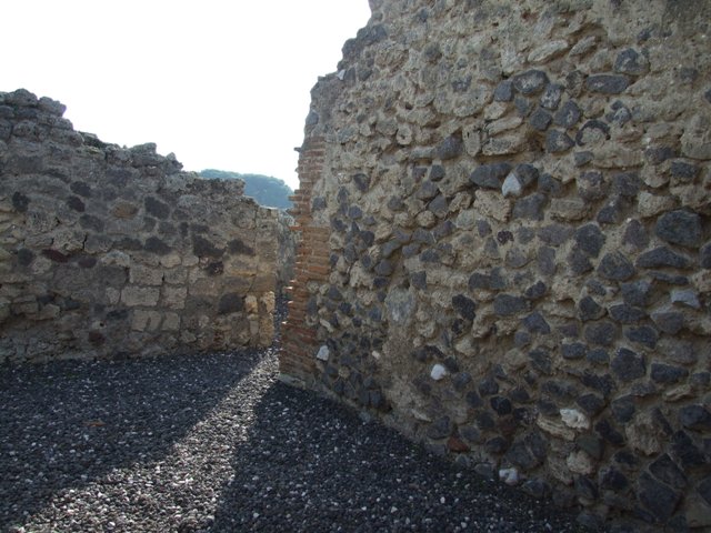 I.3.18 Pompeii. December 2007. East wall, and area of doorway blocked in antiquity, leading to a room in I.3.20.