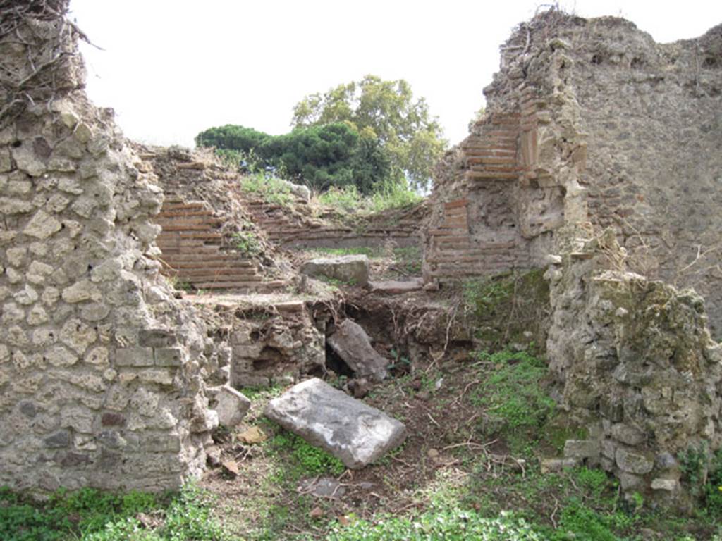 I.3.27 Pompeii. September 2010. Looking towards south wall of bakery room into area containing the remains of the oven. Photo courtesy of Drew Baker.