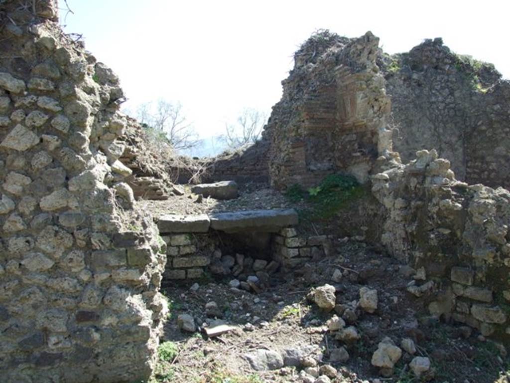 I.3.27 Pompeii.  March 2009. Remains of Oven on south side of Pistrinum..