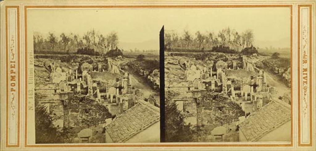 I.4.2 Pompeii. Stereoview by R. Rive, c.1860-1870s.
Looking across atrium towards peristyle at rear, and steps in south-east corner. 
At the rear of the east wall of the peristyle would be the lower (third) peristyle of 1.4.5/25.
Photo courtesy of Rick Bauer.

