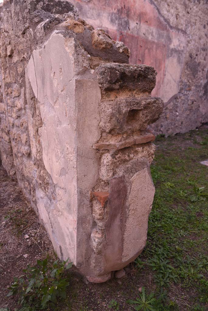 I.4.9 Pompeii. October 2019. 
Room k, doorway pilaster at west end, between room I (L), on left, and room m, on right.
Foto Tobias Busen, ERC Grant 681269 DCOR.
