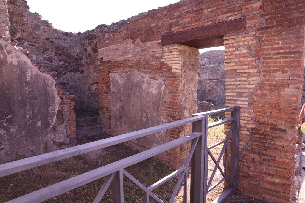 I.4.14 Pompeii. October 2019. Looking towards south wall, with doorway into I.4.13.
Foto Tobias Busen, ERC Grant 681269 DCOR.
