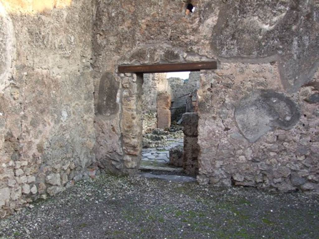 I.4.17 Pompeii. December 2007. Doorway to I.4.12, in south wall of shop-room.