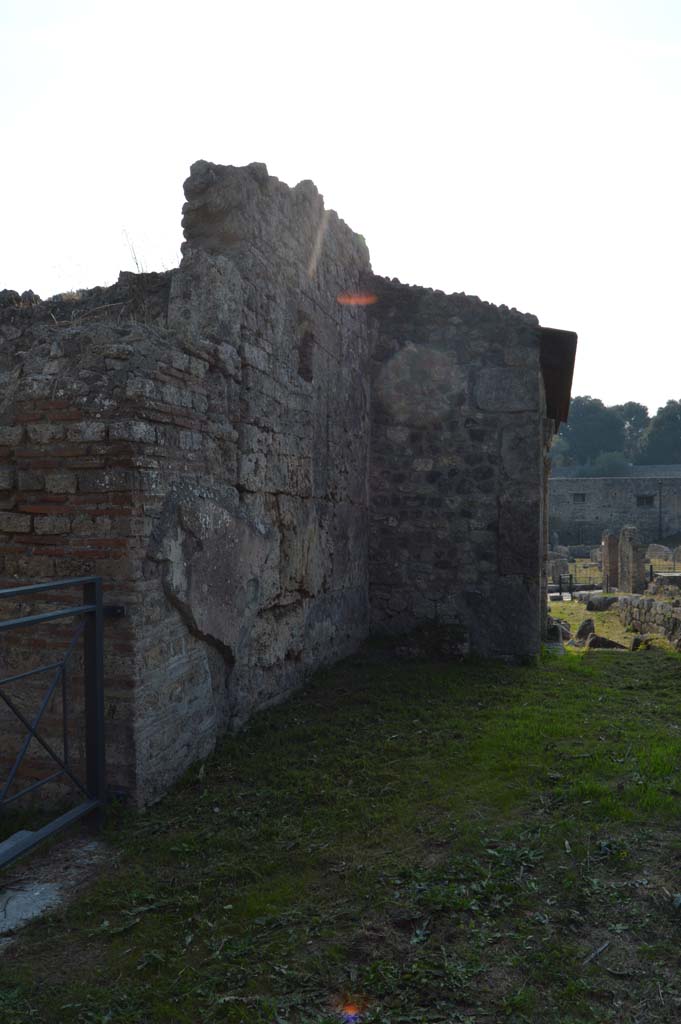 I.5.2 Pompeii, on left, with I.5.1, on right. October 2017. 
Looking west towards street altar, on east side of structure of I.5.1.
Foto Taylor Lauritsen, ERC Grant 681269 DÉCOR.

