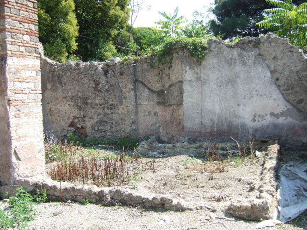 I.5.2 Pompeii. September 2005.  Looking south-east towards south wall of industrial room.