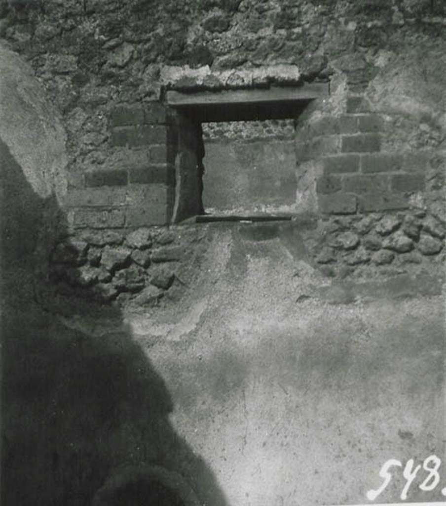 10502-warscher-codex-103-640.jpg
I.5.2 Pompeii. 1936, taken by Tatiana Warscher.  Looking towards east wall with window overlooking the Vicolo del Citarista, in room in north-east corner of industrial area.
Warscher described this window as being from room “S”, the last in photo no.21) (l’ultima sulla fotografia no.21) 
See Warscher T., 1936. Codex Topographicus Pompeianus: Regio I.1, I.5. Rome: DAIR, whose copyright it remains. (no.22b)
