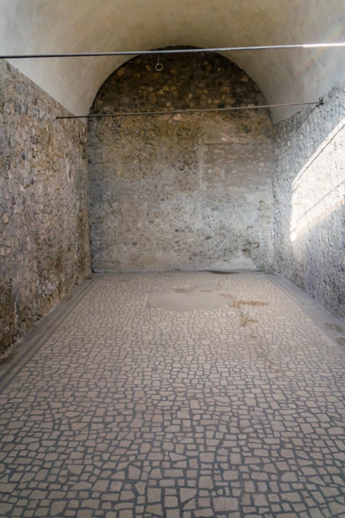 I.6.2 Pompeii. October 2023. 
Looking east across the flooring of oecus/triclinium in south-east corner. Photo courtesy of Johannes Eber.
