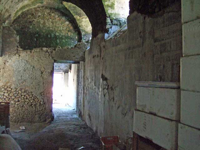 I.6.2 Pompeii. December 2007. West end of south wall of frigidarium, with arched doorway to anteroom.