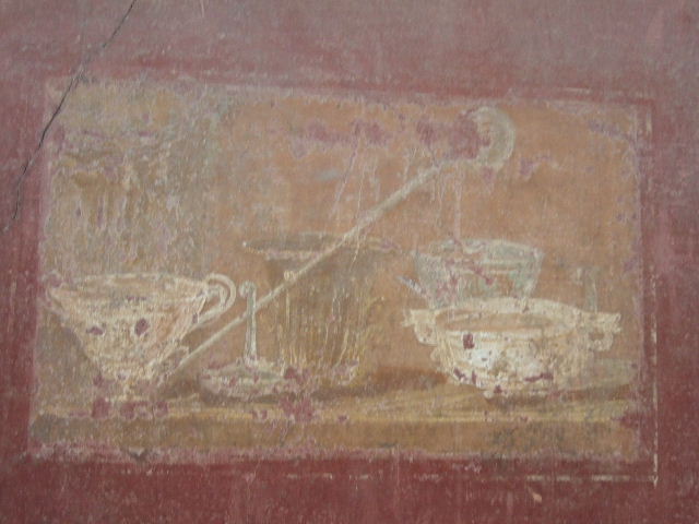 II.6.4 Pompeii.  Room 2, East wall.  Small fragment with painting of birds.