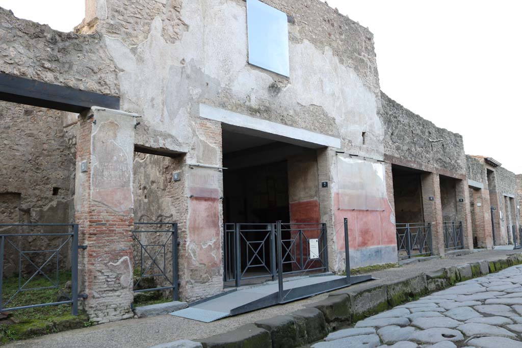 I.6.6 Pompeii. December 2018. 
Small doorway leading to steps to upper floor, on south side of Via dellAbbondanza. Photo courtesy of Aude Durand.

