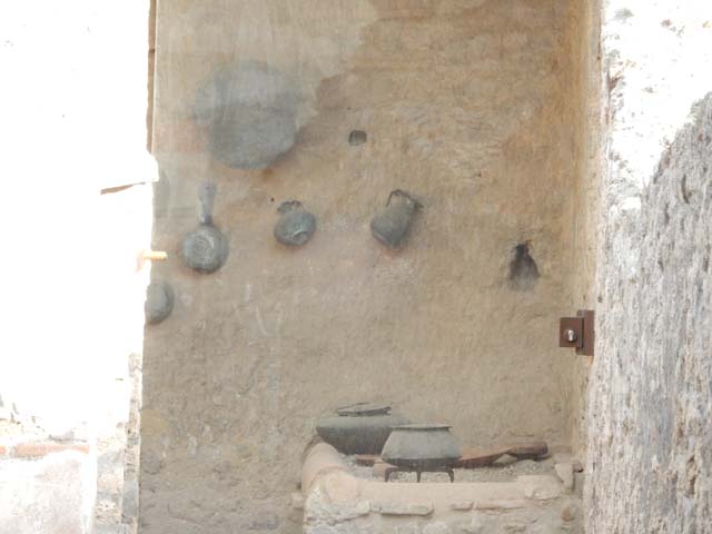 I.6.7 Pompeii. May 2017. Looking towards south wall of kitchen with displayed household items. Photo courtesy of Buzz Ferebee.
