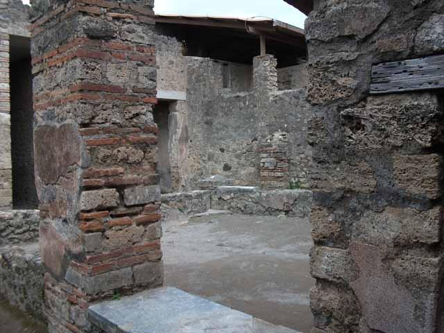 I.6.7 Pompeii. May 2010. Looking north-east across raised garden from passageway leading from kitchen.
