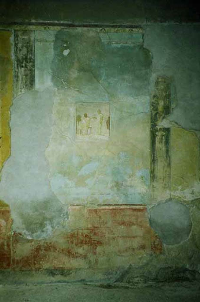 I.6.11 Pompeii. June 2010. Wall painting on west wall of atrium. The house is known as the Casa dei Quadretti Teatrali because of the theatrical scenes painted in the atrium. Photo courtesy of Rick Bauer.
