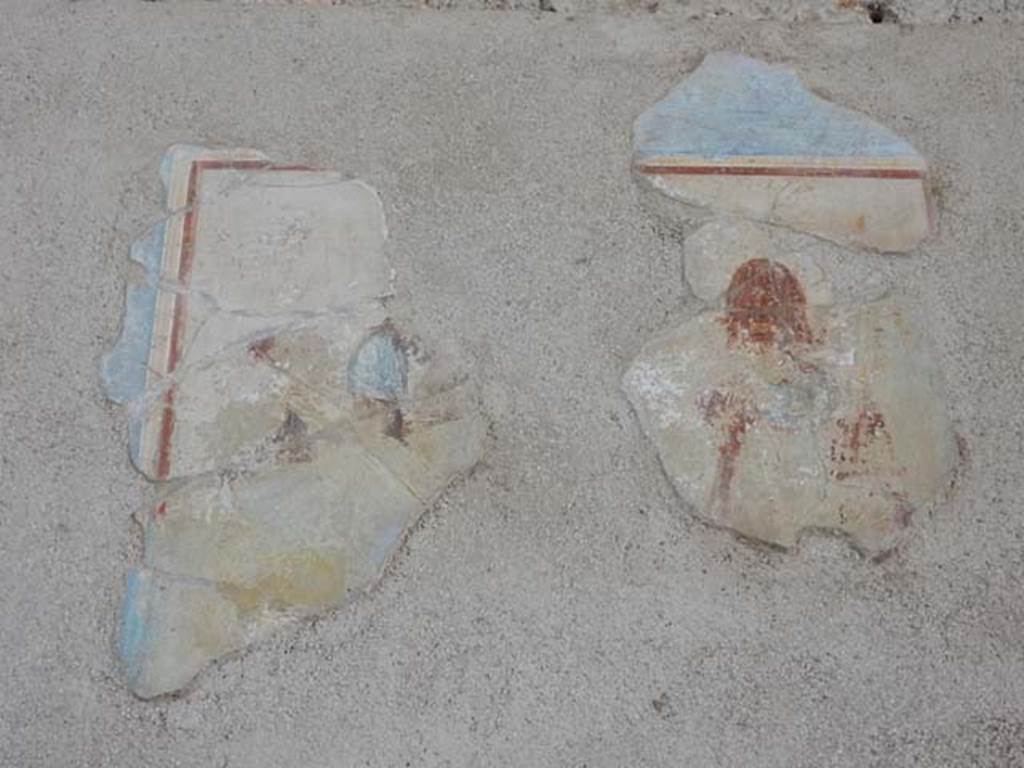 I.6.11 Pompeii. May 2015. East wall of atrium. Remains of wall painting from south side of the door to the second cubiculum in the east wall of atrium. Photo courtesy of Buzz Ferebee. 
