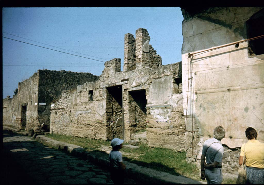 I.6.13 and I.6.14 Pompeii. Entrance doorways on north side of Vicolo del Menandro. 
Photographed 1970-79 by Günther Einhorn, picture courtesy of his son Ralf Einhorn.
