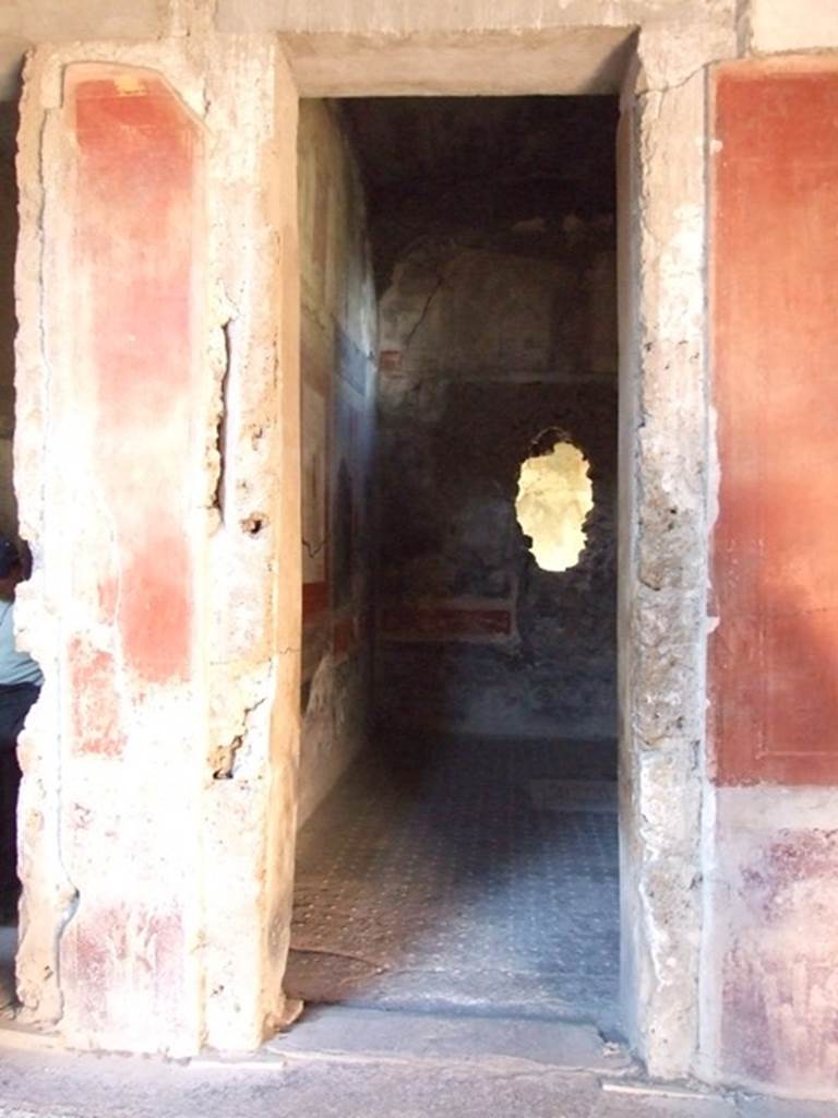 I.6.15 Pompeii.  March 2009. Doorway to room 12, triclinium, in north-east corner of atrium. Looking north.
