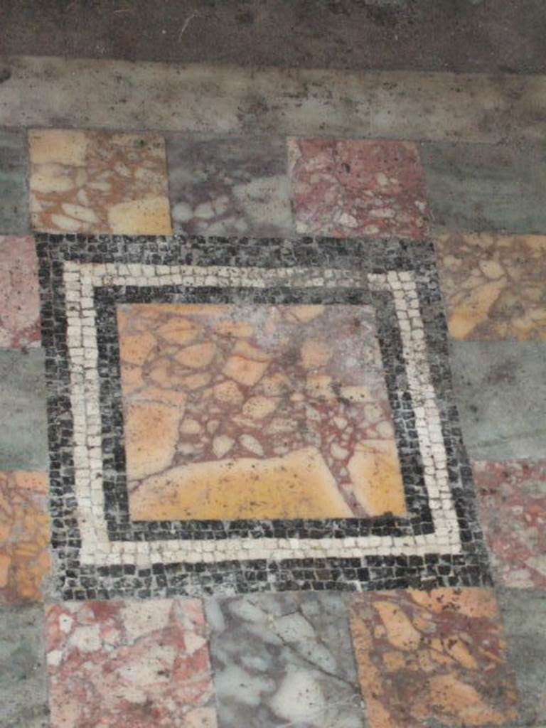 I.6.15 Pompeii.  December 2007.  Room 12,  central emblema of coloured marble.
