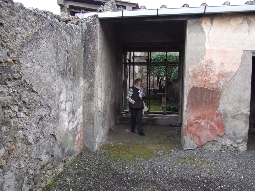 I.7.7 Pompeii. December 2006. Doorway to ala on west side of atrium, leading to garden area and rear rooms.