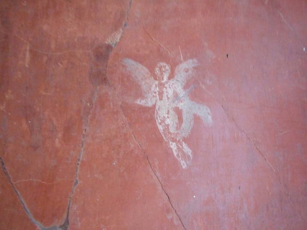 I.7.7 Pompeii. December 2006. Triclinium, detail of wall painting of floating figure, from east wall at south end.