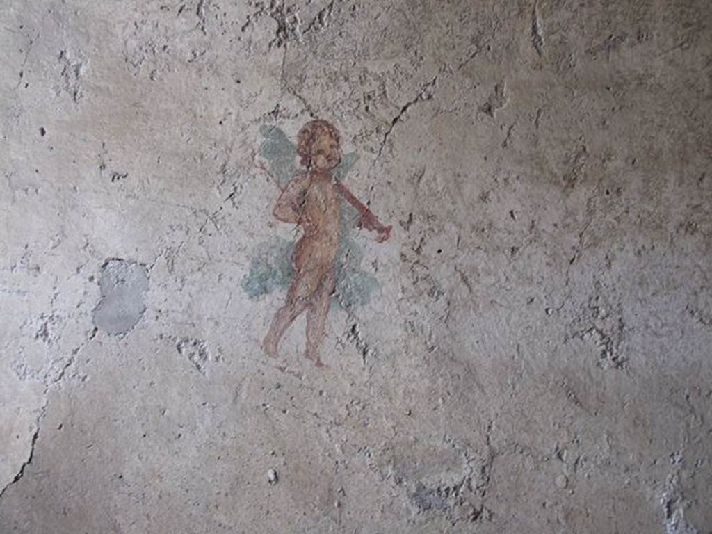 I.7.11 Pompeii. December 2006. Wall painting of cupid with sword from south wall of bedroom on west side of atrium.
