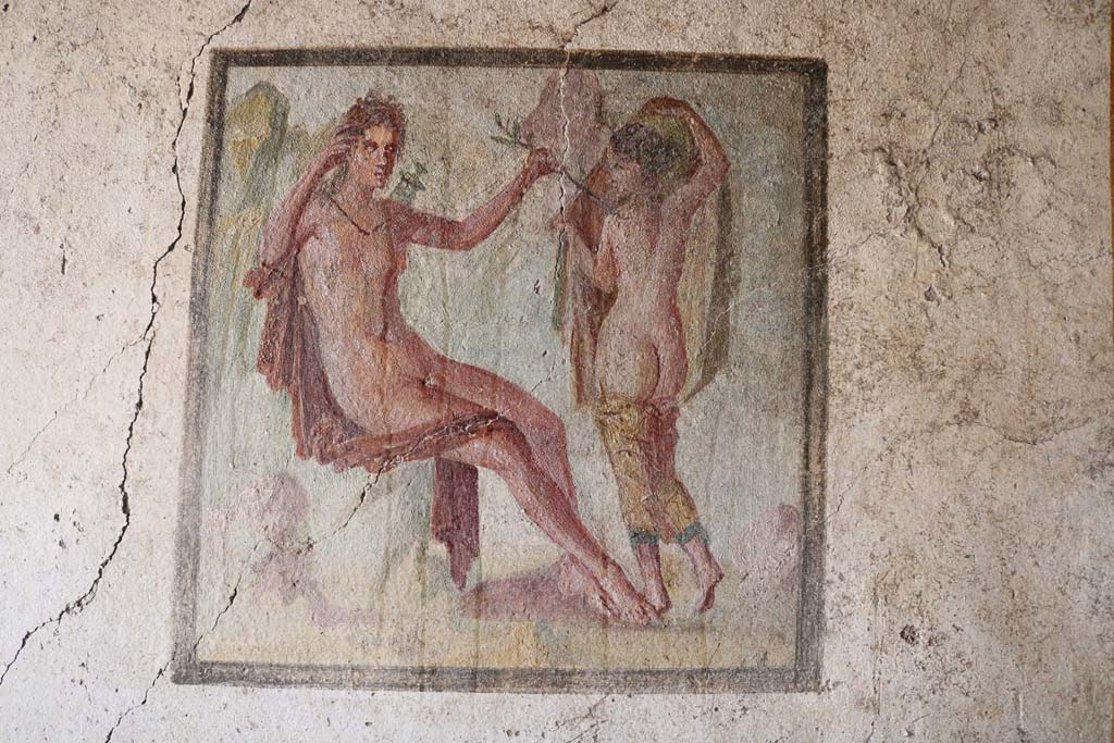 I.7.11 Pompeii. December 2018. Central wall painting of Apollo and Daphne, on south wall. Photo courtesy of Aude Durand.
