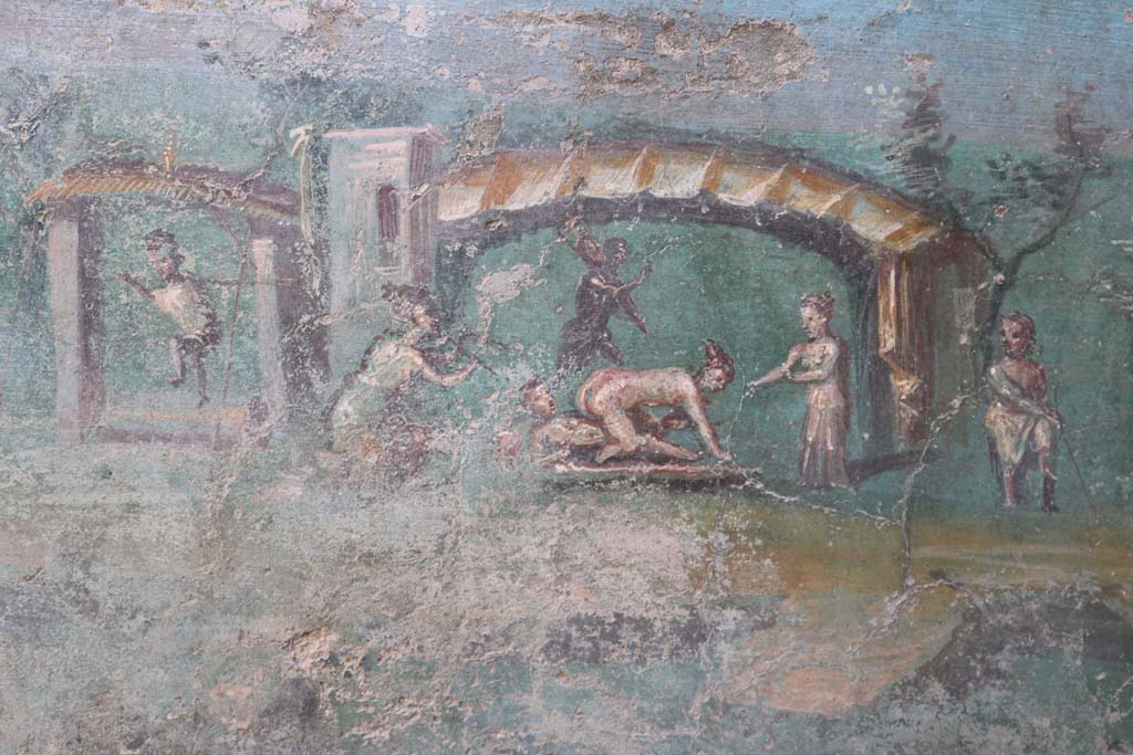 I.7.12 Pompeii. December 2018. 
Viridarium, painted erotic fresco on north end of west side of summer triclinium. Photo courtesy of Aude Durand.
