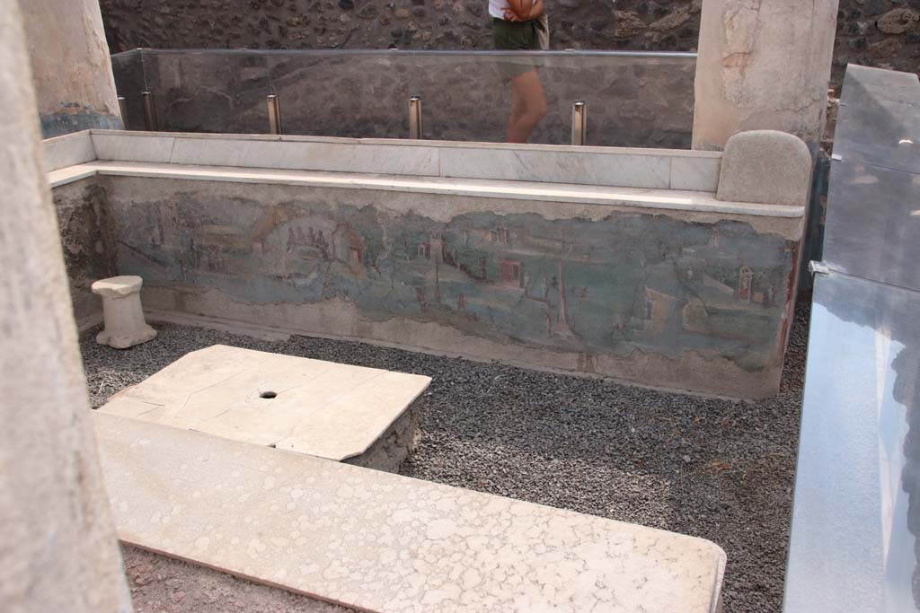 I.7.12 Pompeii. September 2021. Painted panel on inside of west side of summer triclinium. Photo courtesy of Klaus Heese.