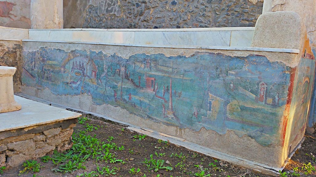 I.7.12 Pompeii. June 2019. Painted panel on inside of west side of summer triclinium. Photo courtesy of Buzz Ferebee.