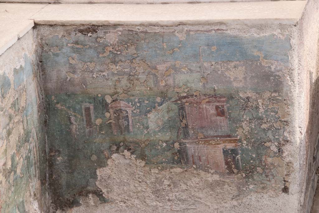 I.7.12 Pompeii. September 2021. Painted panel from south end of east side of summer triclinium.Photo courtesy of Klaus Heese.