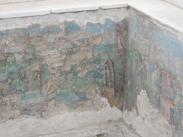 I.7.12 Pompeii. May 2017. Painted panel on inside of east side at south end of summer triclinium. Photo courtesy of Buzz Ferebee.
