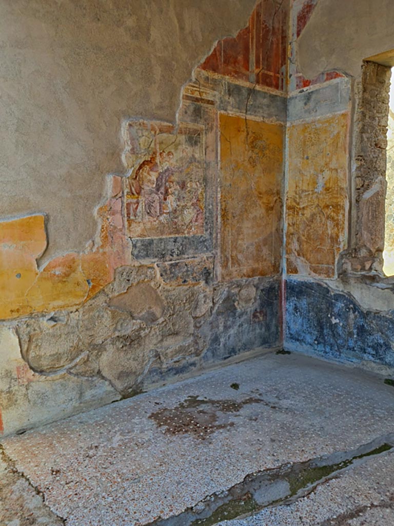 I.7.19 Pompeii. March 2024. 
Looking across flooring towards central wall painting of Aphrodite and Ares on north wall.
Photo courtesy of Giuseppe Ciaramella.
