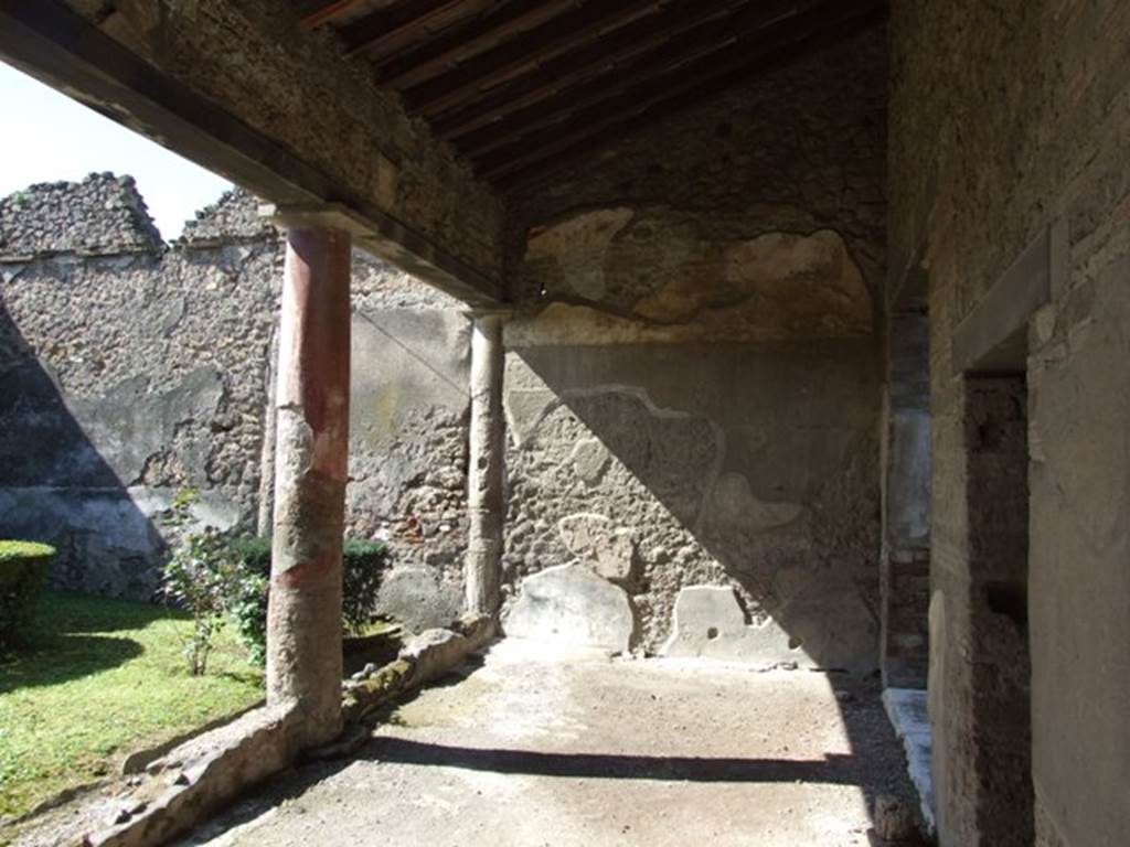 I.8.9 Pompeii. March 2009. Room 8, looking across portico towards west wall.