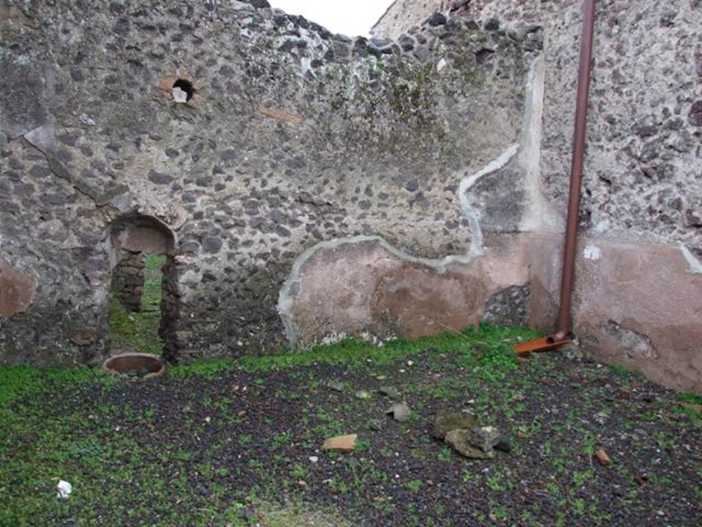 I.8.14 Pompeii. December 2007. Room 6, west wall of garden area, with remains of a high cocciopesto zoccolo, and white upper zone of walls.
