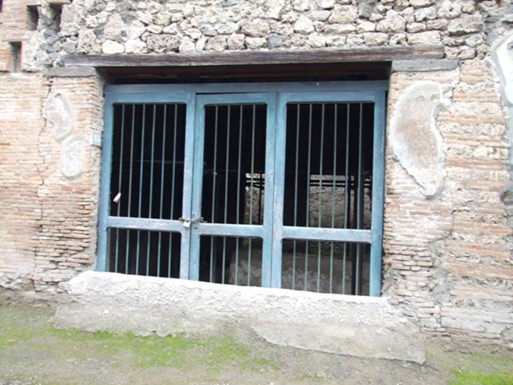 I.8.15 Pompeii. December 2007. Entrance doorway, with remains of plastered façade.